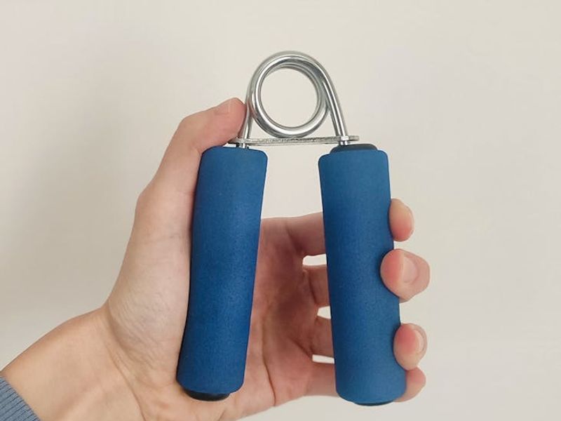 Detailed shot of hands gripping training equipment firmly